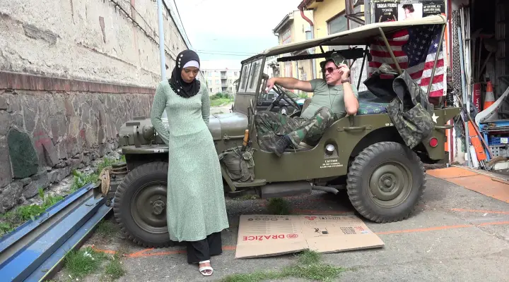 A horny soldier groped a petite woman in a hijab
